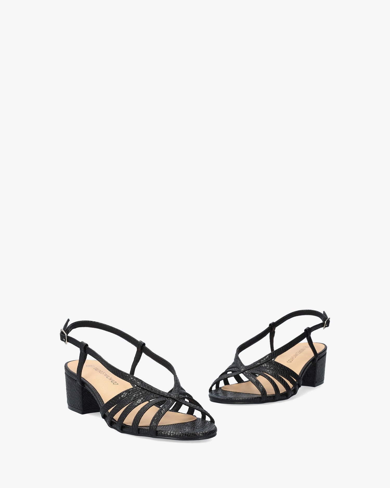 Soft black slingback sandal with a wide heel
