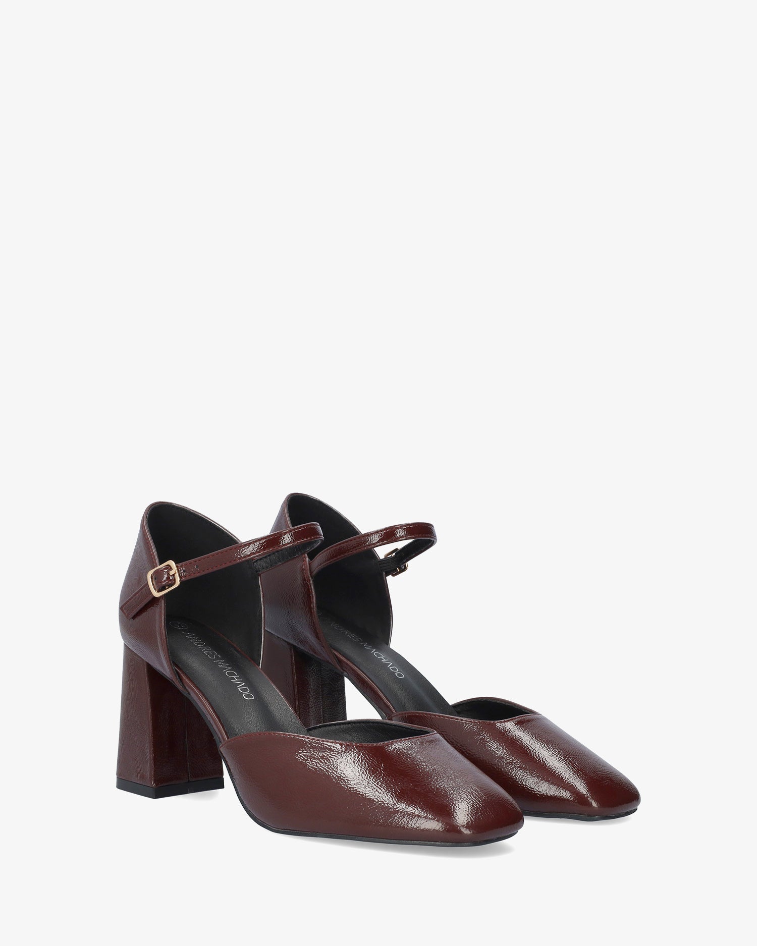 Pumps aus bordeauxfarbenem Lackleder 