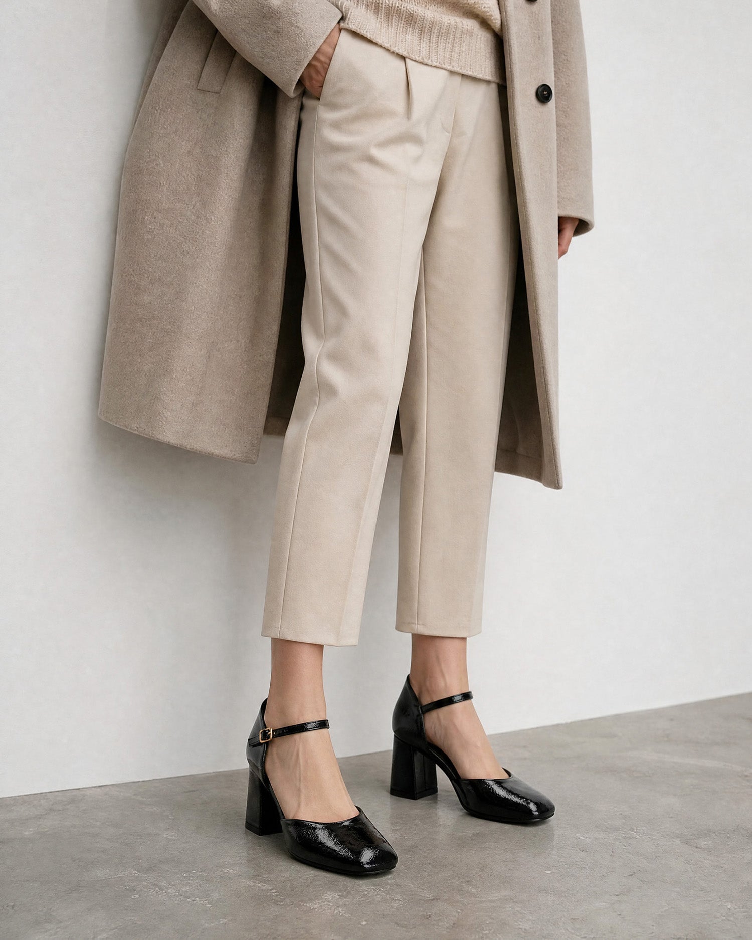 Pumps aus schwarzem Lackleder 