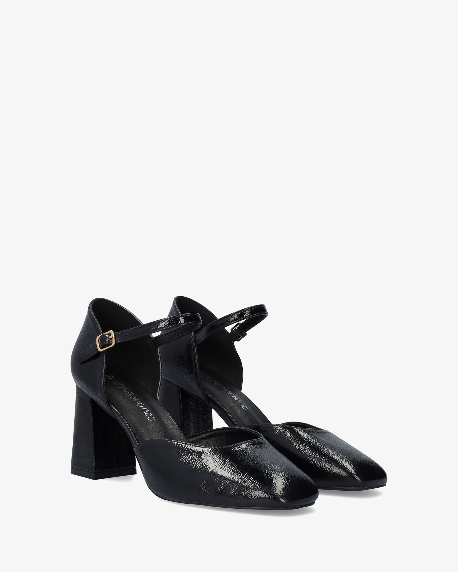 Pumps aus schwarzem Lackleder 