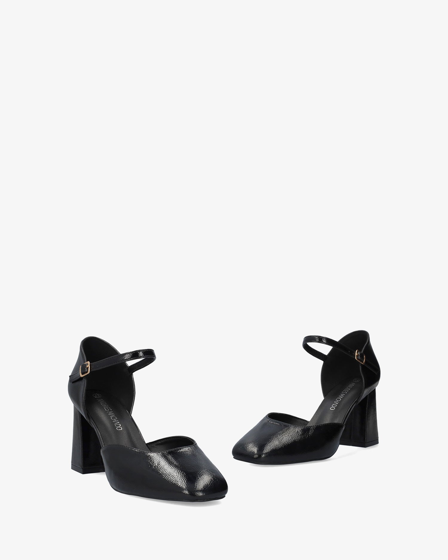 Pumps aus schwarzem Lackleder 