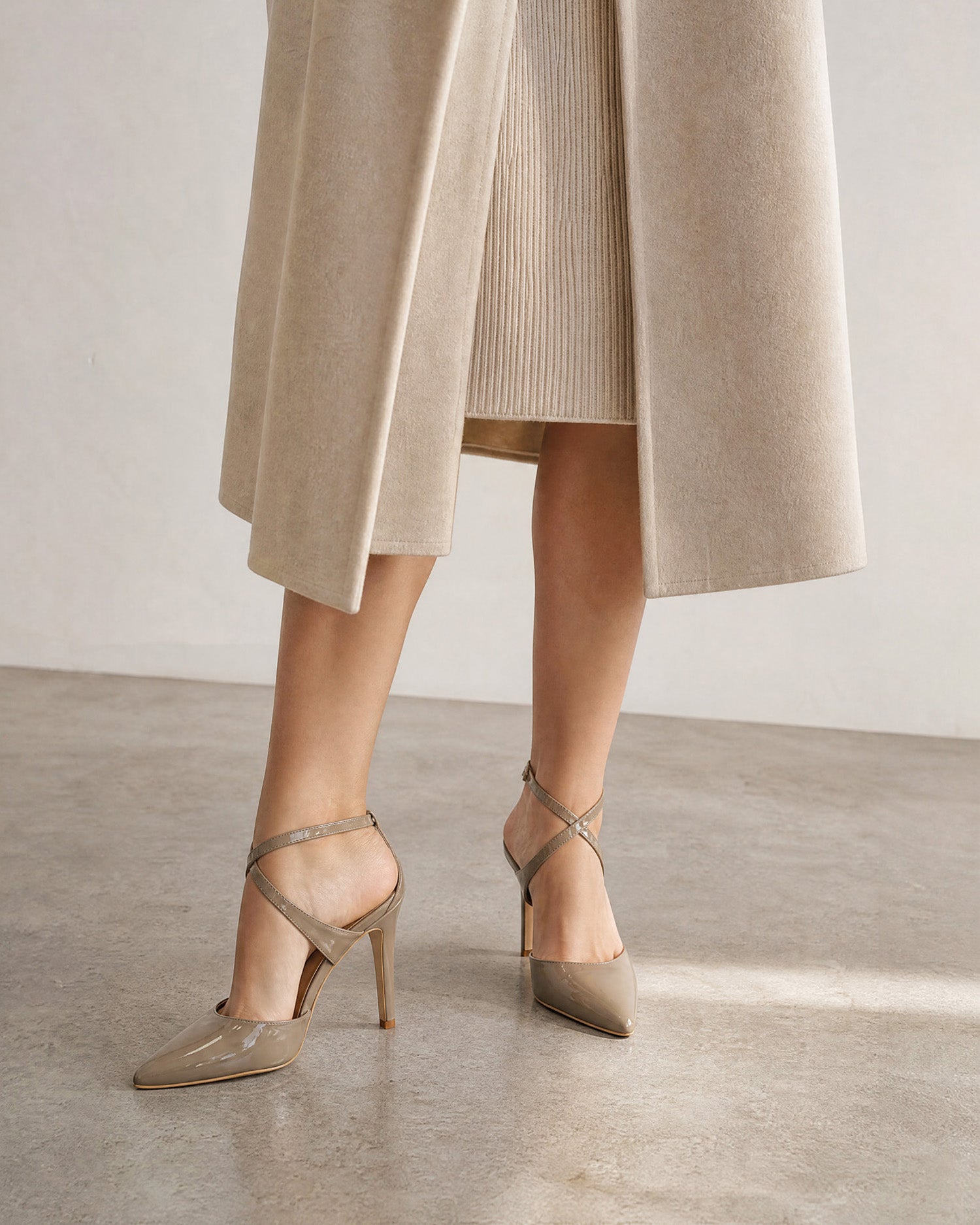 Grey patent slingback court shoes with heel 