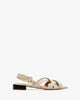 Sandals in beige embossed leather