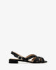 Sandals in black embossed leather
