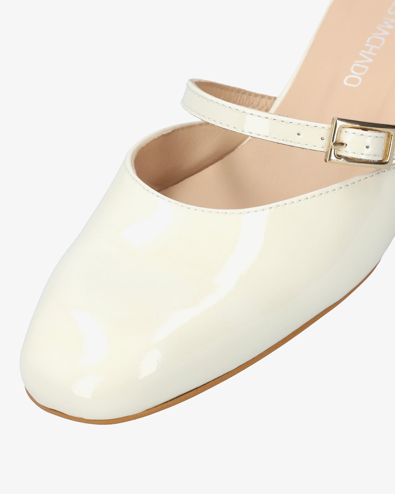 Mule con tacco in pelle verniciata bianco
