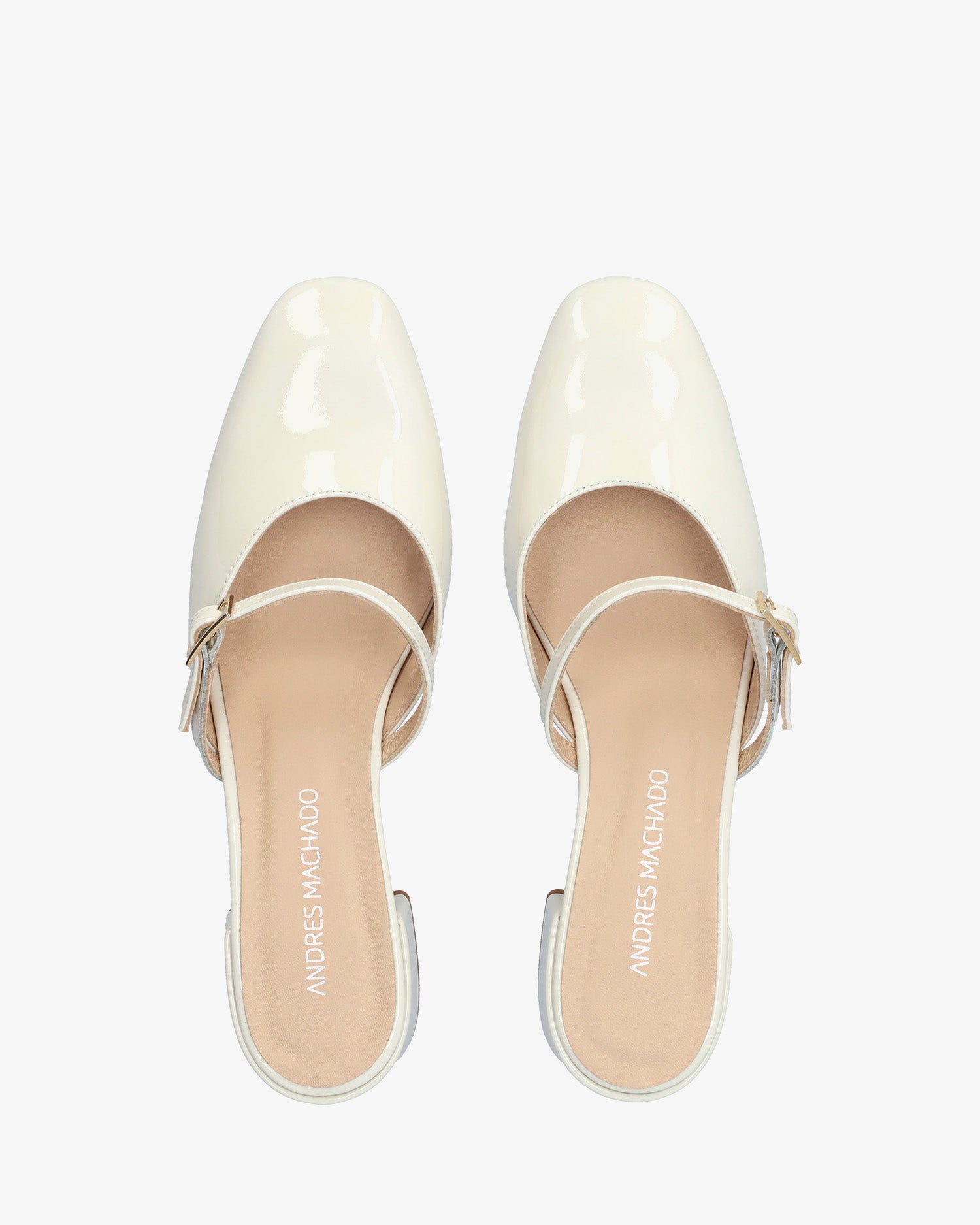 Mule con tacco in pelle verniciata bianco
