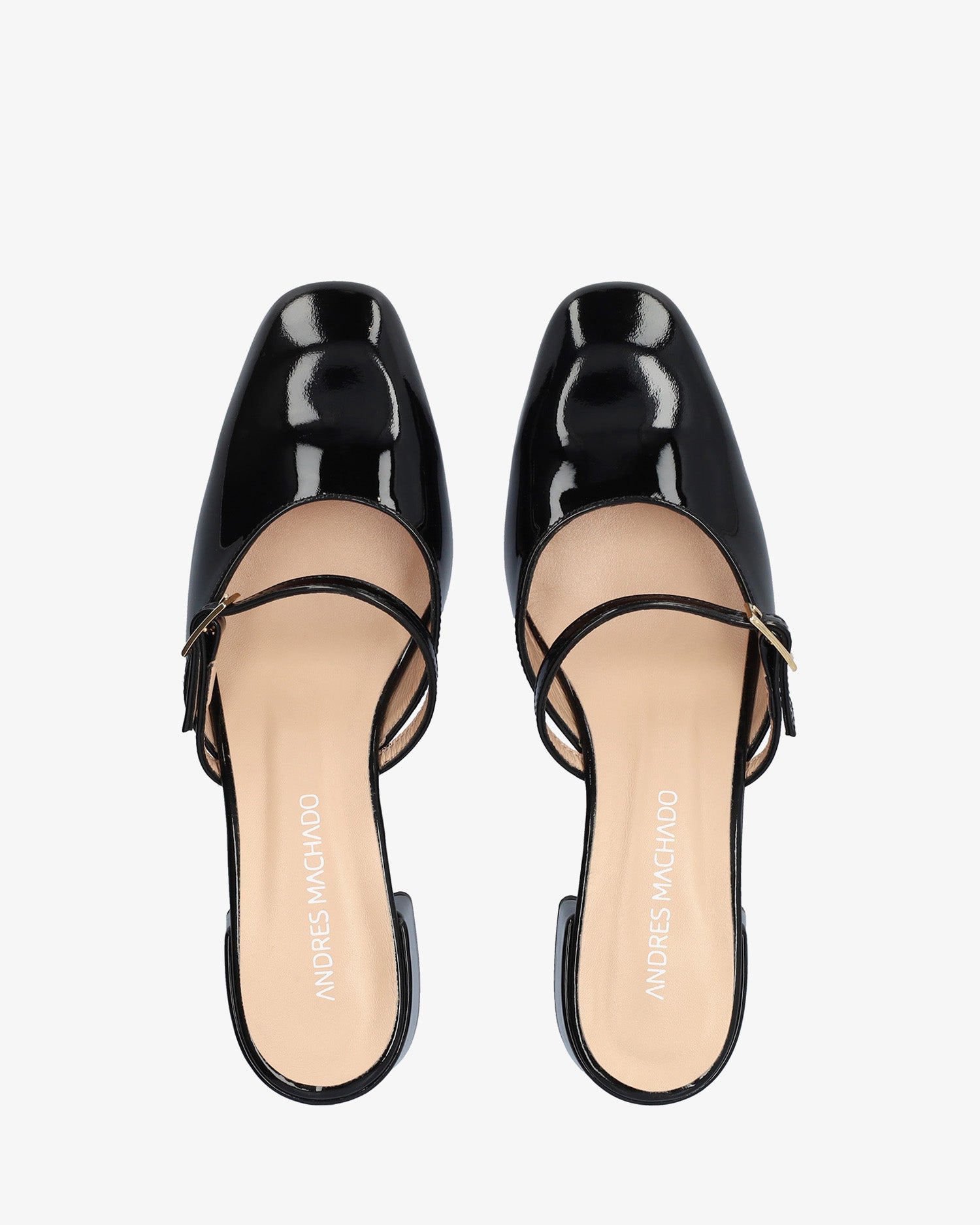 Heeled mule in black patent leather
