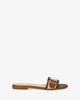 Flat leather sandal in brown
