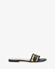 Flat leather sandal in black
