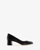 Black leather heeled shoes