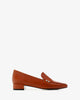 Moccasins in red brick leather