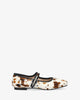 Flat ballerina shoe in cowhide-print leather 
