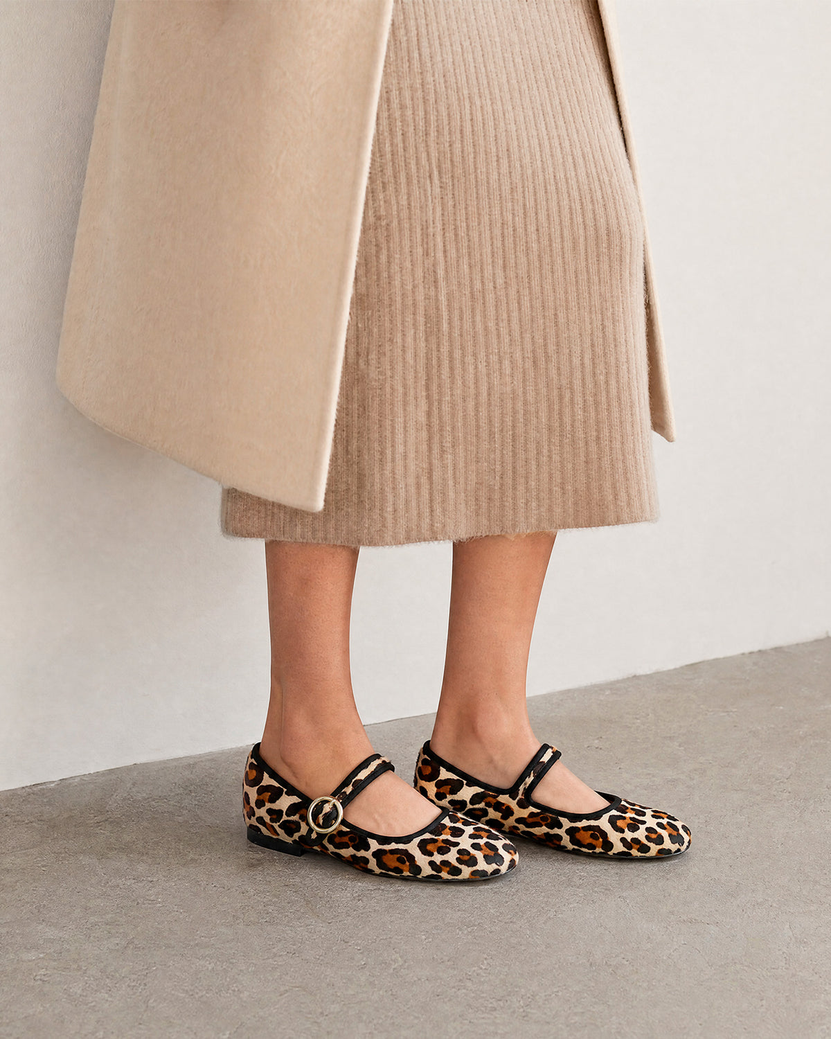 Flat ballerina in leopard-print leather 