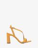 Crossover heeled sandals in orange leather