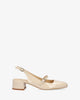 Heeled beige patent leather mary janes